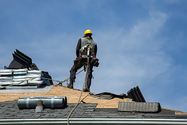 Professional Gutter Installation technician working in Spearville, KS